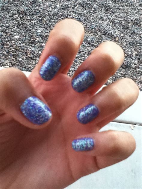 Purple nail polish and blue glitter.. Winter Nails!