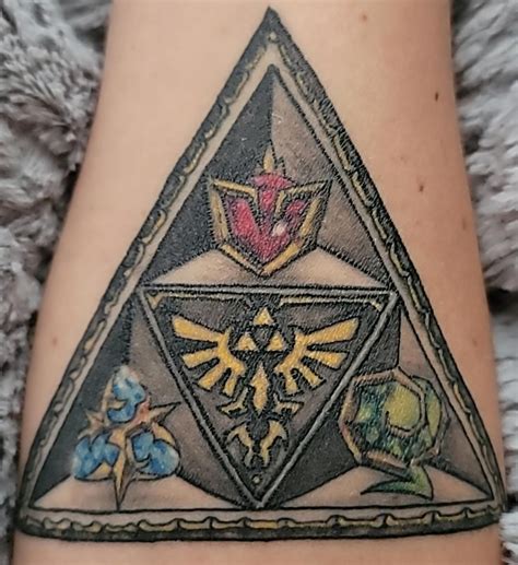 [OC] My first Zelda tattoo. I got it about a week ago so it's still ...