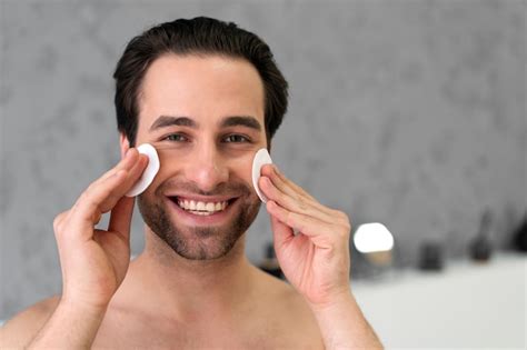 Free Photo | Man doing his self-care ritual