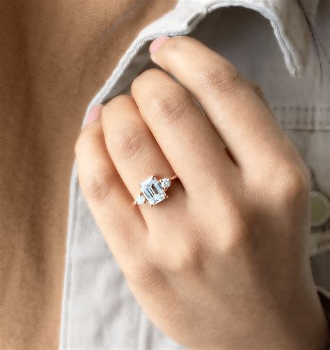 yellow gold engagement ring emerald cut