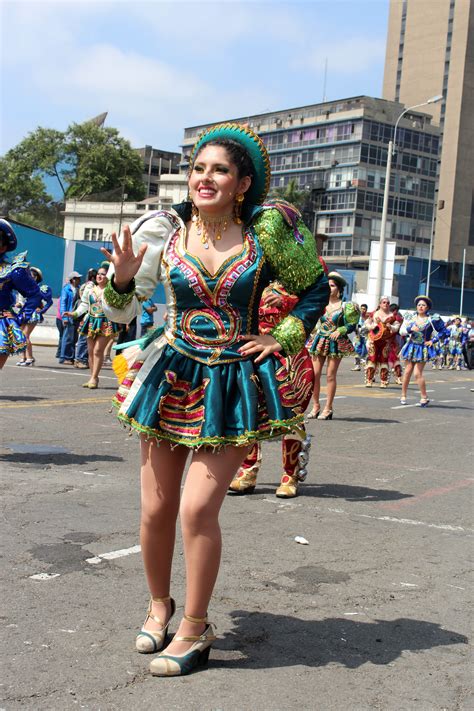 Woman in festival costume dancing in Lima, Peru image - Free stock