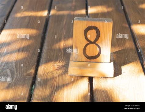 wooden priority number    plank table stock photo alamy