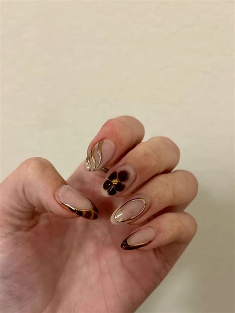Brown nails in 2025 | Long acrylic nails, Nail designs, Gold nails