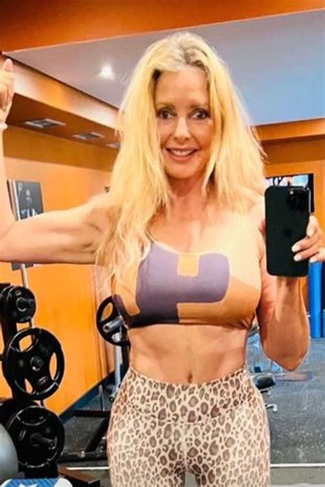 Ripped Carol Vorderman shows off killer abs during Portugal workout