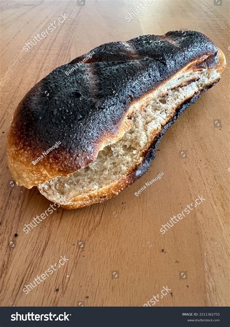 burnt bread unhealthy inedible burnt loaf stock photo