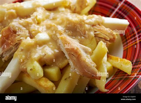 Poutine canadian cuisine Stock Photo - Alamy