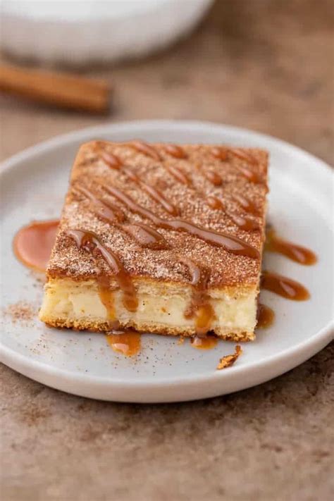 How to Make Easy Churro Cheesecake Bars recipe - Lifestyle of a Foodie