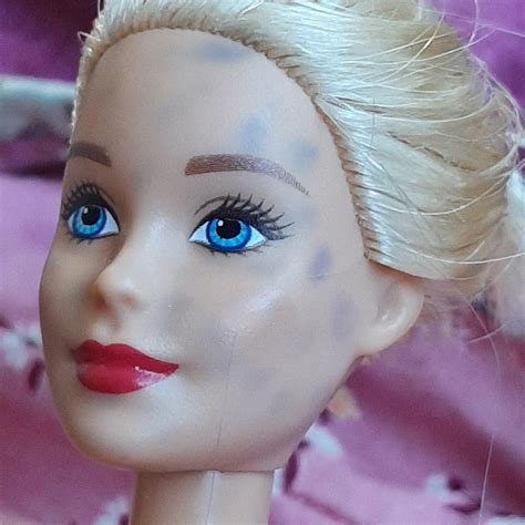 Hey, so I've been trying to get these ink type stains off of my doll's