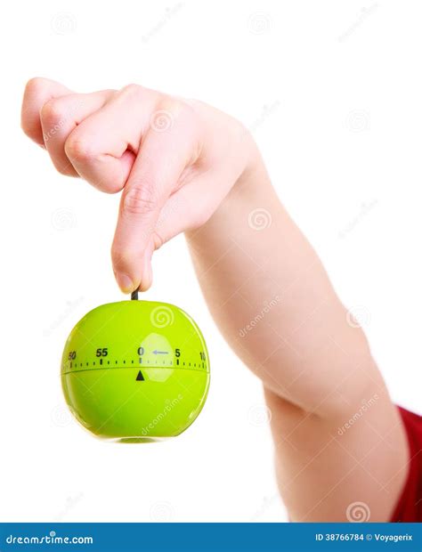 Hand of Housewife Showing Apple Timer Stock Photo - Image of cooking