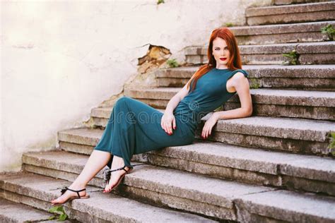 redhead dress stairs stock   royalty  stock