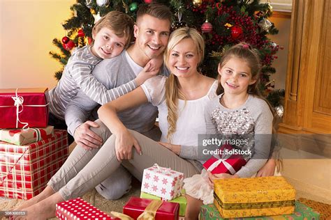 Family On Christmas Day High-Res Stock Photo - Getty Images