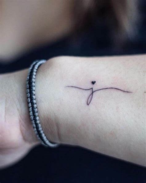 top  initial tattoo designs  meaning   cool ideas