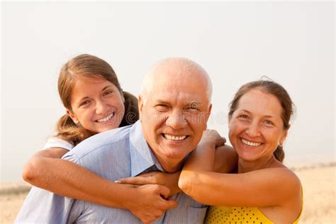 Family of Three stock photo. Image of girls, mother, field - 15434856