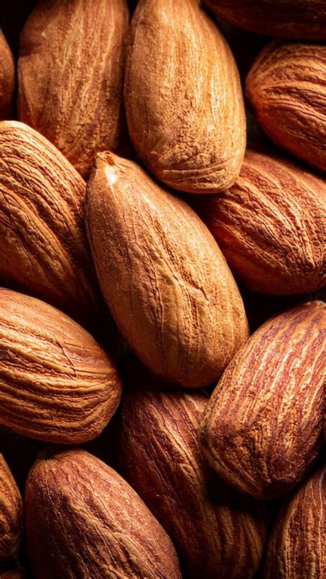 detailed close  image showcasing  almonds  rich brown