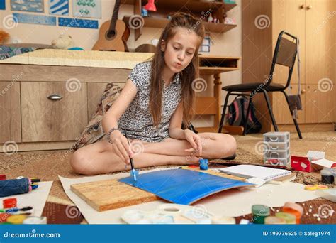 girl draws  home artistic creation  creative artwork