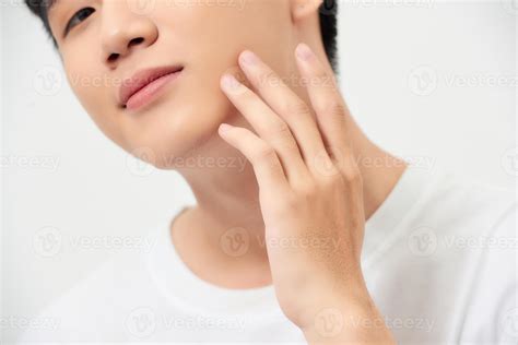 Men Face Care. Man Touching Smooth Skin After Shaving 11134141 Stock