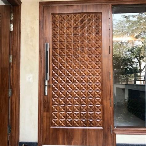 exterior handmade desgine wooden door  home  sq ft  chaspara