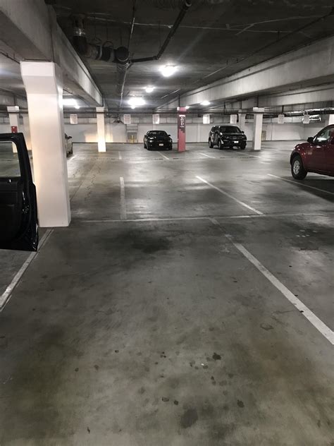 These uneven parking spots. San Diego CA parking garage. : r