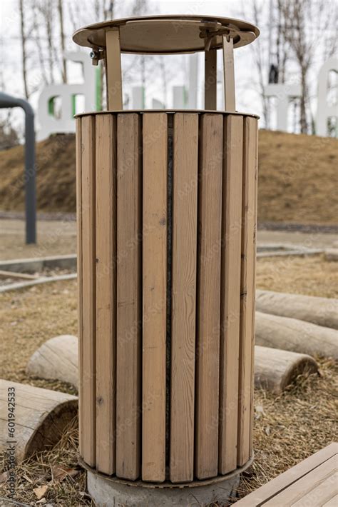 Single rubbish bin, garbage and waste bin made of wooden material in ...