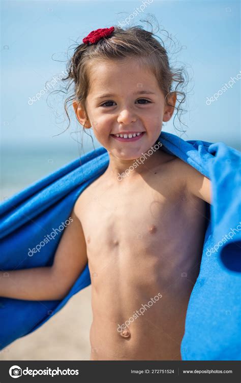 Smiling Portrait Young Girl Beach Towel — Stock Photo © pio3 #272751524