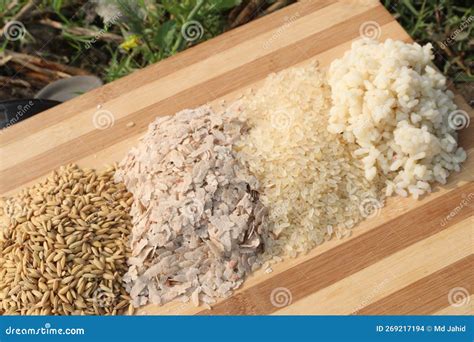 paddy  flattened boiled dry rice  bamboo table stock photo image