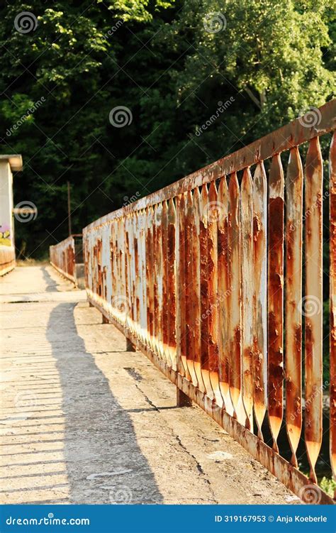 rusted rusty railing handrail rail   abandoned dam   yantra