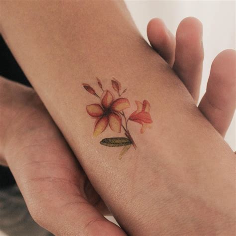 plumeria flower tattoo female