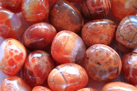 Fire Agate: Discover its Meaning, Uses & Benefits
