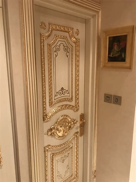 Classic Interior Design: White Door with Gold Trim