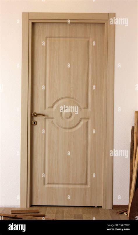 Wooden and modern interior door Stock Photo - Alamy