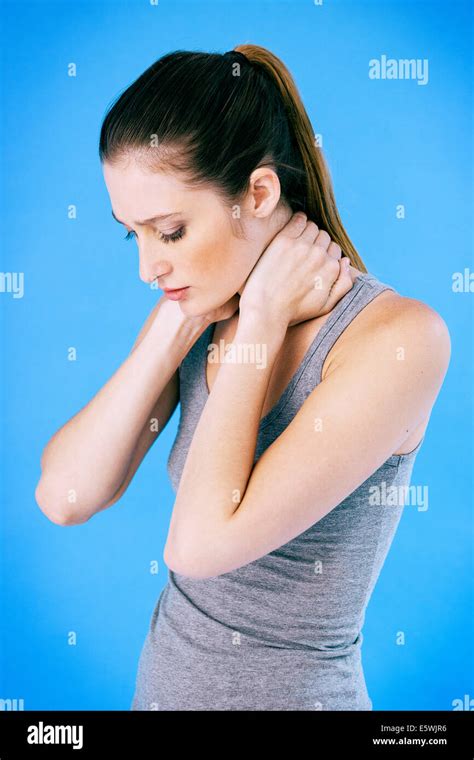 Cervicalgia in a woman Stock Photo - Alamy
