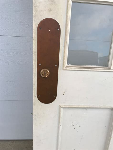 WOOD DOOR WITH MULTI-PANE WINDOW AND KICKPLATE