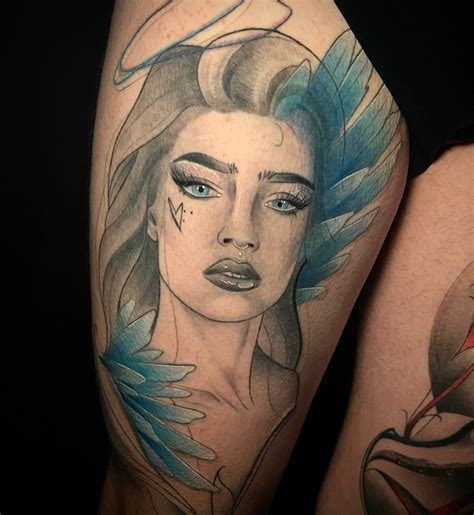Blue Feathered Women Tattoo - Black Rose Tattoo Shop