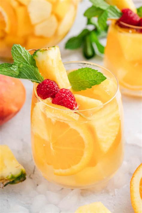 Pineapple Sangria with Mango - Foxes Love Lemons