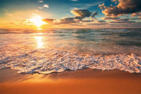 sunsets   beach stock  pictures royalty