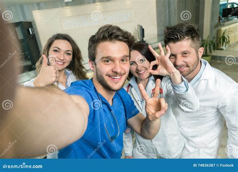 smiling team  doctors  nurses  hospital  selfie stock