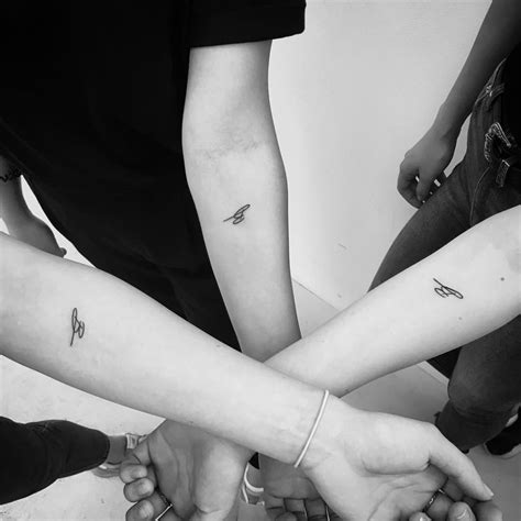 Matching minimal tattoos by Loz Thomas - Tattoogrid.net