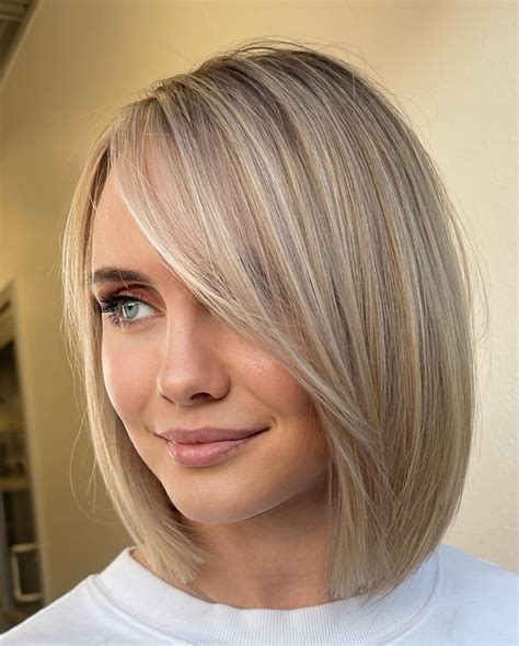 Try bob haircuts with bangs to hide your forehead wrinkles 17