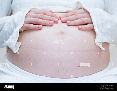Navel belly button bellybutton Stock Photo - Alamy