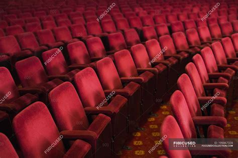 Empty seats in theater auditorium — uniformity, backdrop - Stock Photo ...