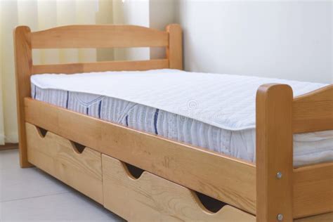 Single bed with drawers stock image. Image of hotel - 237062599