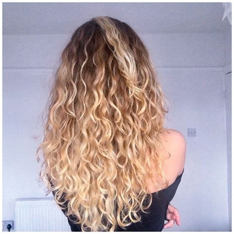 long curly hair naturally blonde | Curly hair photos, Blonde curly hair