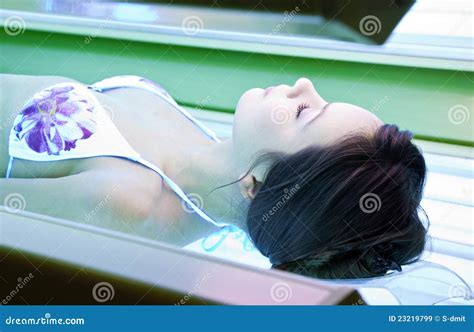 Girl is in a solarium stock image. Image of healthcare - 23219799