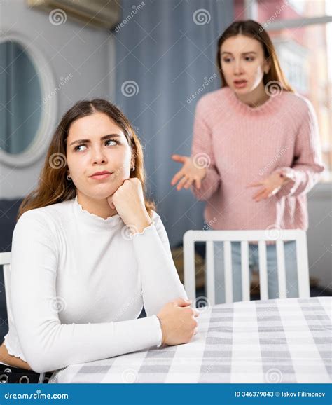 Girlfriend or Sister Yelling at Girl during Family Quarrel Stock Image