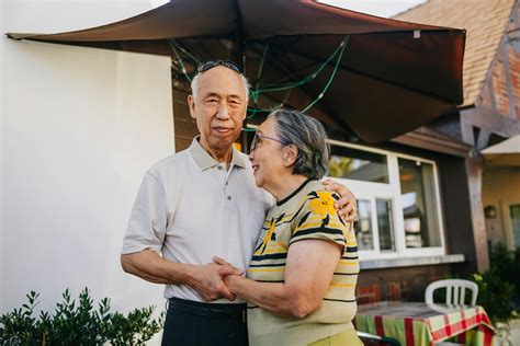 Elderly Couple Exiting the Gate · Free Stock Photo