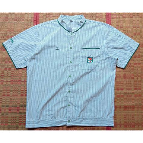 เสื้อแขนสั้นพนักงานเซเว่น | Shopee Thailand