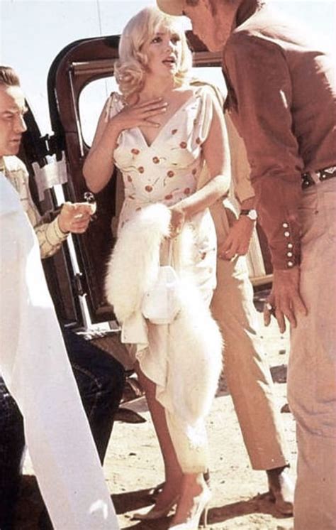 Marilyn Monroe with Clark Gable and Montgomery Clift , behind the ...