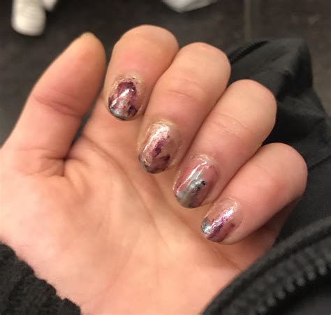 Geode by Accident, using rubbing alcohol, metallic markers, & Revlon