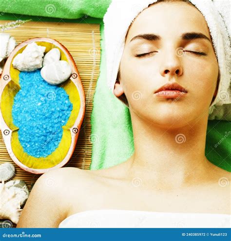 Attractive Lady Getting Spa Treatment in Salon, Close Up Asian Tan