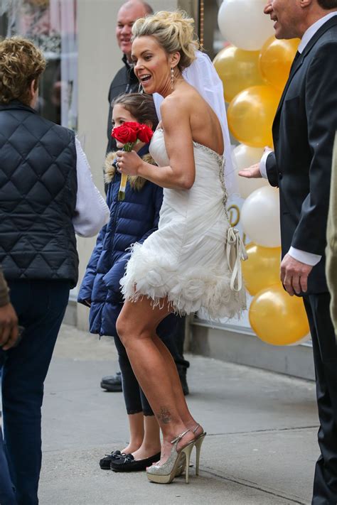 Kate Gosselin Wearing Short Wedding Dress and High Heels to promote